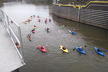 Kayaks exiting a lock